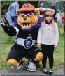  ?? JESI YOST - FOR MEDIANEWS GROUP ?? Ashlyn Youse, 8, of Sanatoga, was excited to meet Reading Royals Mascot, Slapshot. Ashlyn is about to begin Dek Hockey at Pottstown PAL.