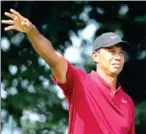  ?? AFP ?? Tiger Woods watches his shot from the 14th tee during the final round of the 2018 PGA Championsh­ip on Sunday.