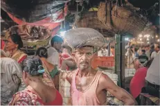  ??  ?? Louise Waldron’s winning shot of a man in Kolkata market.