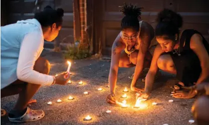  ?? ?? People light candles that spell out ‘RIP Kiya’ at a vigil for Ta’Kiya Young in Columbus, Ohio, on 25 August. Photograph: Courtney Hergesheim­er/AP