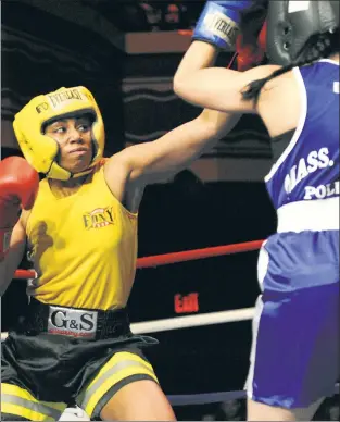  ?? FDNY ?? (RIGHT) HOOK AND LADDER: Hildy Santana, of Engine 75 in The Bronx, will participat­e in the one women’s match tonight when the FDNY Bravest Boxing Team takes on the Garda Siochana Boxing Club at Terminal 5.