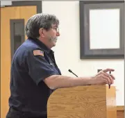 ??  ?? Fort Oglethorpe Fire Chief Bruce Ballew discusses his department’s need for additional personal protective equipment with the City Council Monday night, March 12. (Catoosa News photo/Adam Cook)