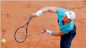  ?? AP ?? Kevin Anderson of South Africa serves against Diego Schwartzma­n during their fourth round match on Monday. Diego won 1-6, 2-6, 7-5, 7-6(7-0), 6-2.