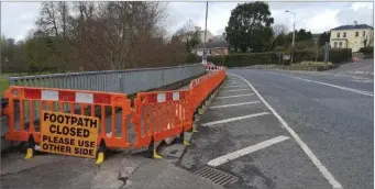  ??  ?? The section of footpath on the N72 in Fermoy that has been closed to the public for almost four years.