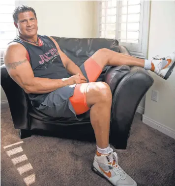  ?? JOSHUA DAHL, USA TODAY SPORTS ?? Jose Canseco relaxes at his Las Vegas home, where he has a remote setup to provide pregame and postgame commentary on 25 Athletics games this season.