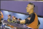  ??  ?? Ex-51s first baseman Luis Garcia watches his Naranjeros de Hermosillo teammates in the Mexican Baseball Fiesta at Cashman Field on Saturday.