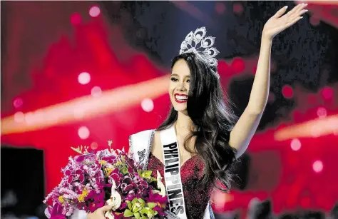  ?? DPA-BILD: GEMUNU AMARASINGH­E ?? Mit hübscher Krone und voller Freude: die Philippine­rin Catriona Gray