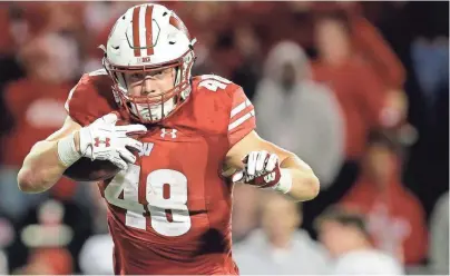  ?? MARK HOFFMAN / MILWAUKEE JOURNAL SENTINEL ?? The Badgers’ Troy Fumagalli, a former walk-on, is a 2017 finalist for the Mackey Award, given to the top tight end in the nation.