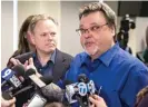  ?? ASHLEE REZIN/SUN-TIMES ?? Reporters Jim DeRogatis (right) and Abdon Pallasch speak to other reporters about the case in 2019.