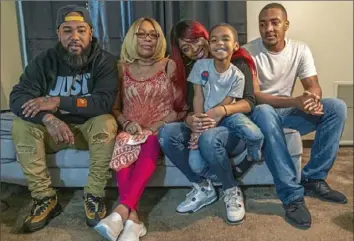  ?? Christian Snyder/Post-Gazette ?? The family of Tameka Dallas at the home of Tameka’s mother, Laura, in Pitcairn on Saturday. From left, her brother, Brandon, mother Laura, daughter Talasia, grandson Donny and son Raymont.