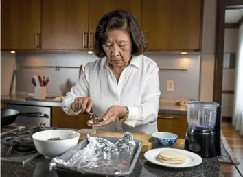  ?? ?? Susanna Foo makes Wild Mushroom Dumplings at her home in Villanova.