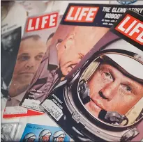  ?? Associated Press ?? A Sept. 1966 edition of LIFE Magazine showing John Glenn rests in a showcase at the John & Annie Glenn Museum on Friday in New Concord, Ohio.