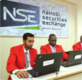  ??  ?? Traders at the Nairobi Exchange Stock Exchange