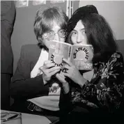  ??  ?? John Lennon and Yoko Ono posing at a book signing session at Selfridges in London on July 15, 1971