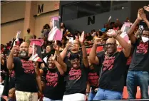  ?? ?? Supporters of Brittany Scott celebrate as she walks across the stage.