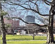  ?? Hearst Connecticu­t Media file photo ?? The Hartford’s headquarte­rs building at One Hartford Plaza, center, is seen from Bushnell Park in downtown Hartford. A new partnershi­p between The Hartford and Yale School of Medicine aims to improve pain management and addiction treatment for injured workers.