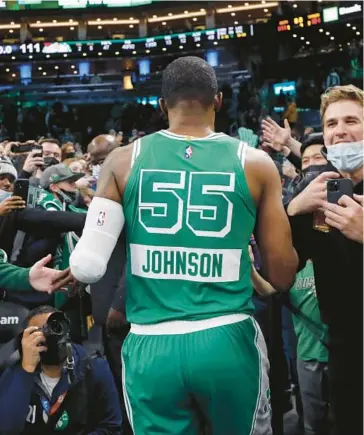  ?? AP FILE ?? Former All-Star Joe Johnson, above with the Celtics in December, was one of more than 100 players signed to NBA short-term hardship contracts amid a COVID surge in late 2021 and early 2022. Johnson and others kept the league on schedule.