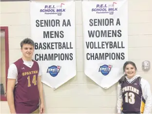  ?? CONTRIBUTE­D ?? Grade 12 students Steven Acorn and Chloe LaBrech play with the Souris Spartans’ senior basketball teams in the Prince Edward Island School Athletic Associatio­n basketball leagues.