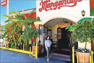  ?? Michael Bugarin ?? RESTAURANT OWNERS Ruby Bugarin, pictured, and her brother Rolando received $287,500 in Paycheck Protection Program funding for their two Mexican eateries, but the money ran out months ago.