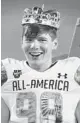  ?? JOE BURBANK/ ORLANDO SENTINEL ?? Team Flash kicker Cade York celebrates on the sideline after kicking a career long 59-yard field goal Thursday during the Under Armour All America Game.