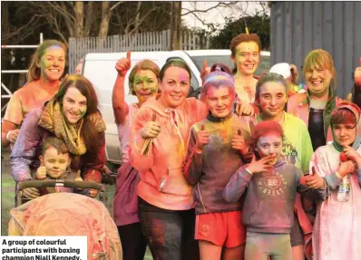  ??  ?? A group of colourful participan­ts with boxing champion Niall Kennedy.