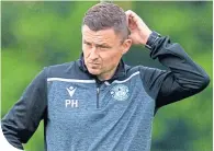  ??  ?? Hibs boss Paul Heckingbot­tom