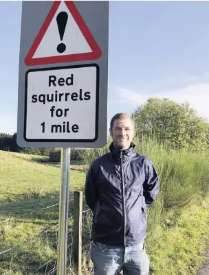  ??  ?? Warning Tom Bowser has welcomed the erection of the sign near the entrance to Argaty Red Kites, Doune