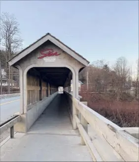  ??  ?? One of several covered bridges you'll find around Stowe, Vt.