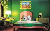  ?? TAMMY LJUNGBLAD tljungblad@kcstar.com ?? Osa Harper, 10, and her sister, Maggie Harper, 4, of Kansas City, tried out the bed in The Great Green Room, an exhibit based on the book “Goodnight Moon.”