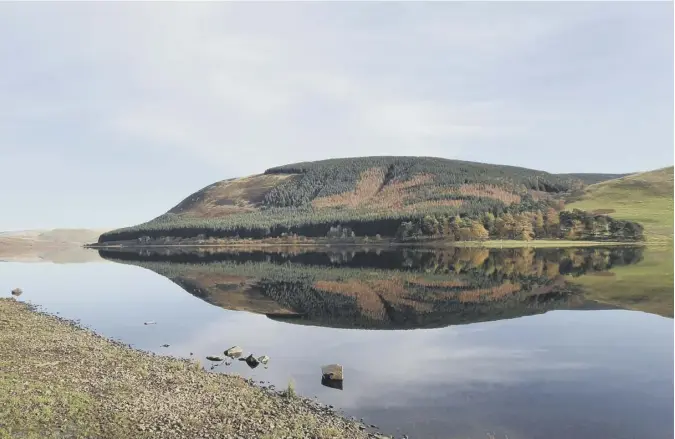  ??  ?? 0 Lindsey Knox of Hawick writes: ‘I stopped on my way to Grey Mare’s Tail and Loch Skeen to take this mirror image of St Mary’s Loch which reminds me of the nib on a fountain pen.’