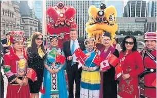  ?? MAYOR JOHN TORY TWITTER ?? Toronto Mayor John Tory helped officials from the local Chinese community raise the Chinese flag at city hall’s ceremonial flagpole in September 2018. He has decided to skip the event this year.