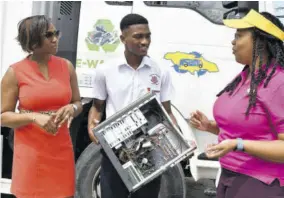  ?? ?? Dirk Harrison shares his vision with mom Diahann Gordon Harrison (left) and Kimberly Blair, NSWMA communicat­ions manager.