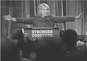 ?? ANDREW HARNIK, AP ?? Democrat Hillary Clinton speaks Friday at an LBGT for Hillary Gala in New York.
