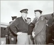  ?? Contribute­d ?? Lt. Gen. Lucius D. Clay with General of the Army Dwight D. Eisenhower at Gatow Airport in Berlin during the Potsdam Conference in 1945.