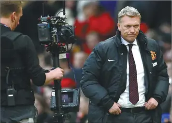  ?? DARREN STAPLES/REUTERS ?? Manchester United manager David Moyes reacts after losing to Newcastle United in their English Premier League match at Old Trafford in Manchester on Saturday.