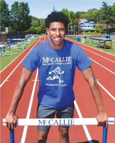  ?? STAFF PHOTO BY ANGELA LEWIS FOSTER ?? Hakim McMorris left his home in Southern California at age 14 to attend McCallie, not long after his mother died from breast cancer. McMorris has since establishe­d himself as perhaps the school’s best athlete and a leader who gives his best in...