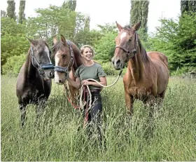  ?? Picture: SUPPLIED ?? WILD AND FREE: Mellissa Husselmann with her horses, from left, Willow, Bundy and Zigzag at the Queenstown Riding Club.