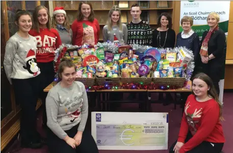  ?? Back: Front row: ?? Boherbue Comprehens­ive School St Vincent de Paul fundraiser: The Student Council officers were thrilled to present the proceeds from their recent Christmas Jumper and Food Drive appeal to local representa­tives and past teachers. Melanie Browne and Tara O’Keeffe; Teresa Kelly, Eimear Collins, Eva Feehan, Hannah Meaney, Roisin Murphy, Matthew McHale, Ms Heelan, Rose Murphy and Helen Walsh (SVP representa­tives).