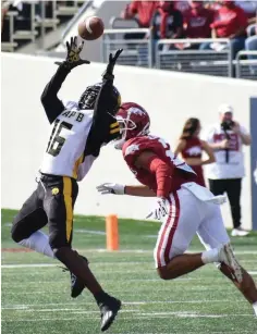  ?? (Pine Bluff Commercial/I.C. Murrell) ?? UAPB receiver Daemon Dawkins brings down a big first-quarter catch against Arkansas safety Myles Slusher in October 2021 in Little Rock.