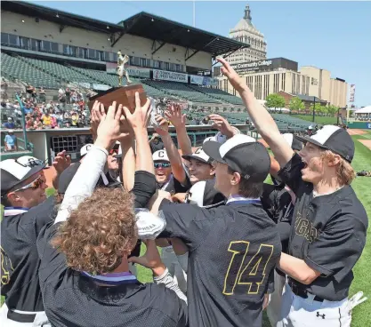  ?? SHAWN DOWD/ROCHESTER DEMOCRAT AND CHRONICLE ?? HF-L players celebrate with the championsh­ip brick after winning Section V Class A2.