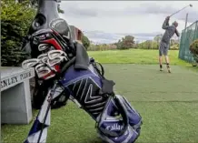  ?? Associated Press ?? A golfer tees off at Bob O’Connor Golf Course at SChenley Park the day courses were permitted to reopen last month.