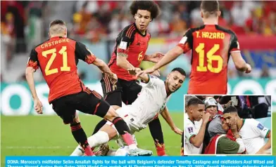  ?? ?? DOHA: Morocco’s midfielder Selim Amallah fights for the ball with Belgium’s defender Timothy Castagne and midfielder­s Axel Witsel and Thorgan Hazard during their Qatar 2022 World Cup match at Al-Thumama Stadium on Nov 27, 2022. (Inset) Morocco’s defender Achraf Hakimi is kissed by his mother at the end of the match. — AFP ( See Page 16)