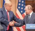  ?? CHRIS MCGRATH/GETTY IMAGES ?? President Donald Trump meets with Russian leader Vladimir Putin in Finland in 2018.