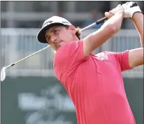  ?? Associated Press photo ?? Kelly Kraft tees off on 18 during the second round of A Military Tribute at The Greenbrier golf tournament Friday in White Sulphur Springs, W.Va.