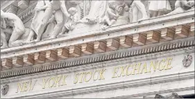  ?? Seth Wenig / Associated Press ?? The Nasdaq composite on Monday fell 10.5 percent from its all-time high Feb. 12, causing a correction on Wall Street.