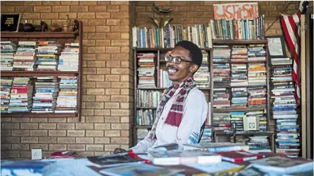  ?? – Photos: AFP ?? in Thami Mazibuko’s childhood home, the 36-year-old has turned the upper level into a bookstore and library, now overflowin­g with hundreds of donations.