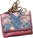  ??  ?? Freesia – Dusty Pink,
The Leather Garden, ` 10,400/USD144; theleather­garden.com