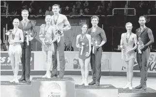  ?? MATTHEW STOCKMAN/GETTY IMAGES ?? Tarah Kayne and Danny O’Shea, Alexa Scimeca-Knierim and Christophe­r Knierim, Deanna Stellato-Dudek and Nathan Bartholoma­y, Ashley Cain and Timothy LeDuc on the medals podium after the pairs competitio­n.