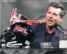  ?? ED BAILEY/ THE ASSOCIATED PRESS/ FILES ?? Vince McMahon, shown here peddling the ill-fated XFL to the media in 2001, said Thursday that a new version of a springtime football league would be reintroduc­ed in 2020.