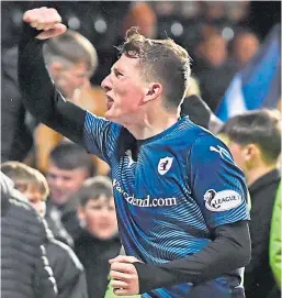  ??  ?? Regan Hendry celebrates his winning goal with the Raith supporters.